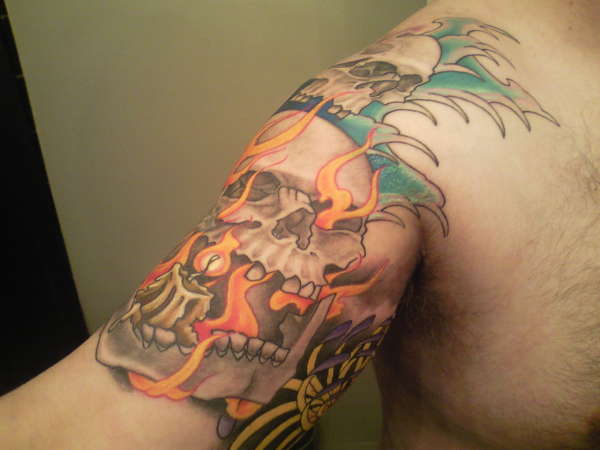 element skull quarter sleeve tattoo