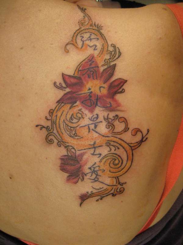 flower/symbols tattoo