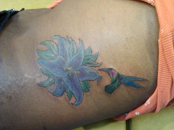 flowers and hummingbird tattoo