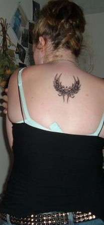 Heart with wings David Bollt tattoo