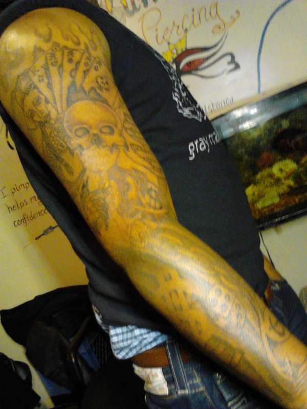 $ root of evil tattoo