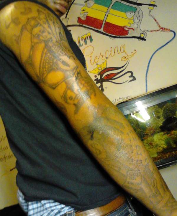 $ root of evil tattoo