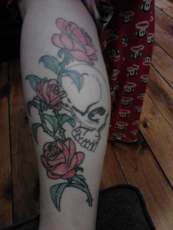 rose with skull tattoo