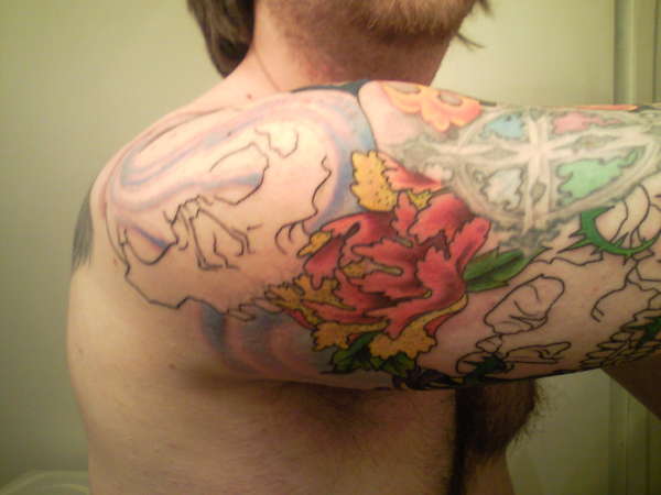 skull element quarter sleeve tattoo