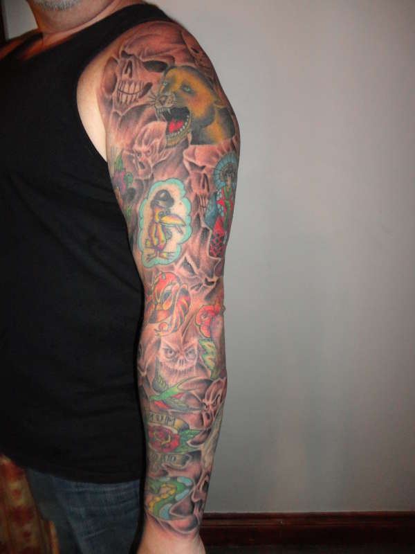 Left Arm - Skulls tattoo