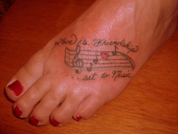 Music notes tattoo