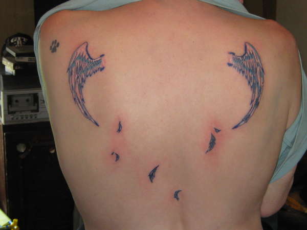 PAMELAS ANGEL WINGS tattoo