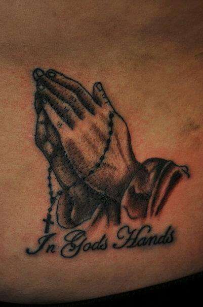 Praying hands tattoo