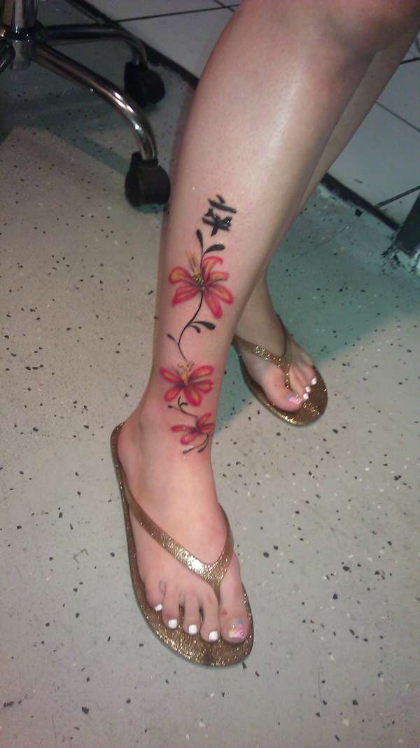 custom floral design tattoo