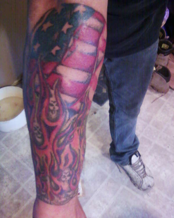 flames and flag tattoo