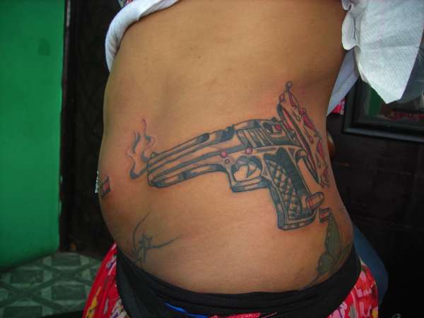 gun tattoo