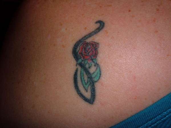 tribal rose on shoulder tattoo