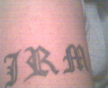 Old english Initials tattoo