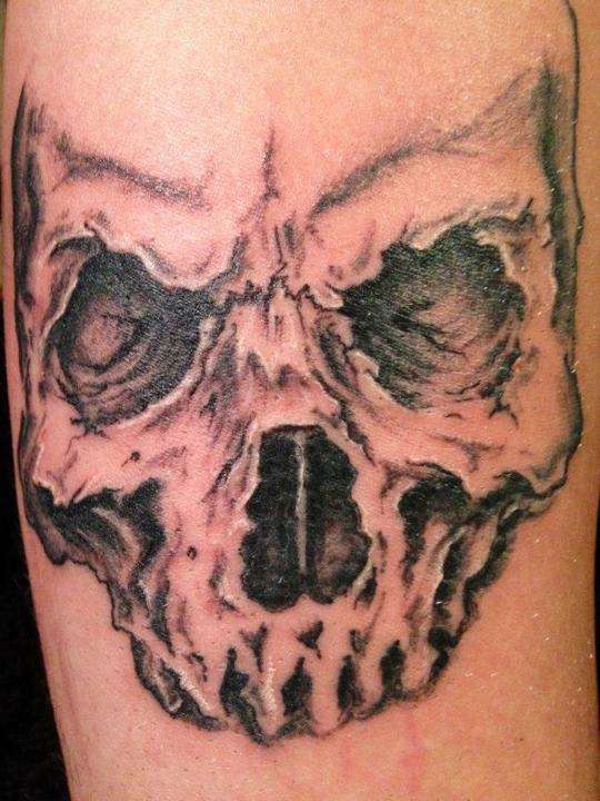skull on arm tattoo
