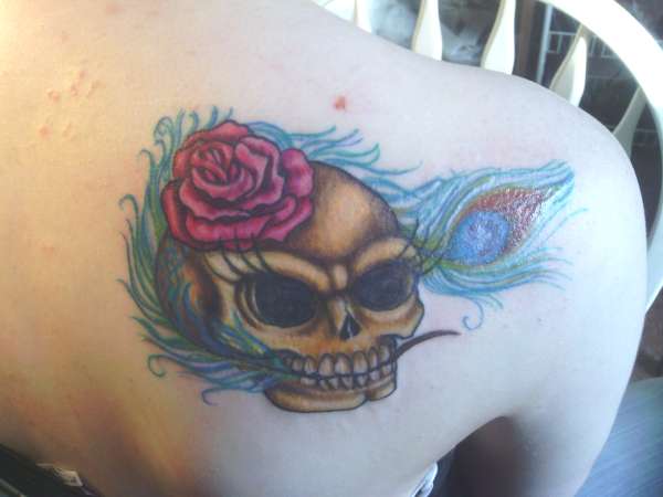 skull peacock tattoo