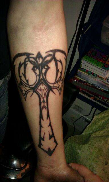 tribal cross tattoo