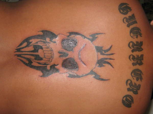 tribal skull tattoo