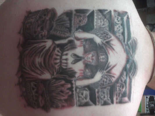 Back piece tattoo