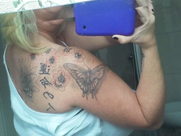 Butterfly and flowers tattoo