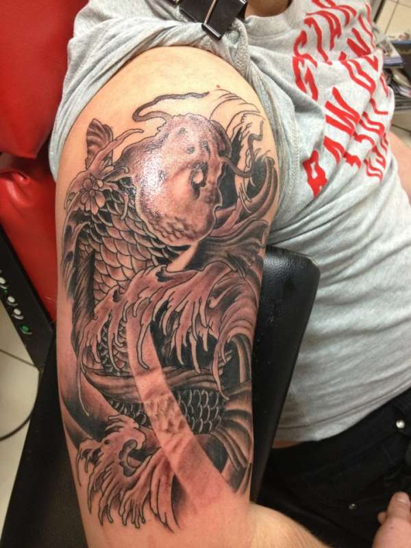 Koi Fish Half Sleeve tattoo