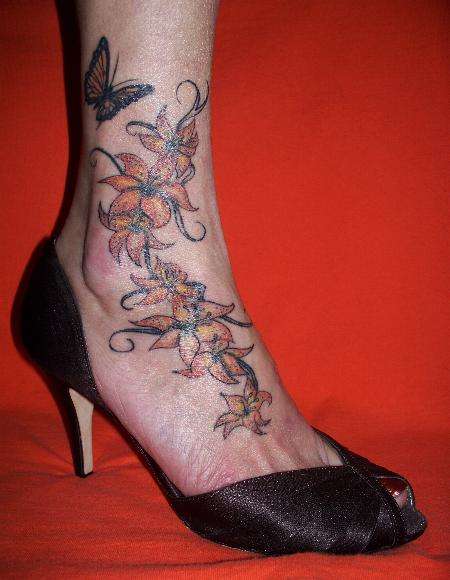 Tiger lilies and butterfly tattoo
