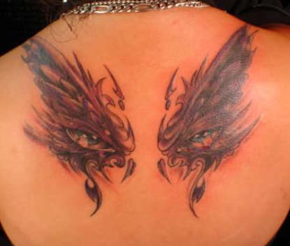 Wings & Eyes tattoo