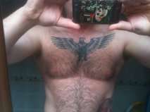 hubbys chest piece tattoo