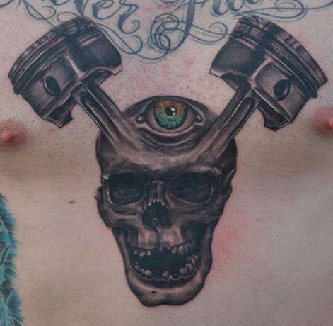 Skull with pistons tattoo