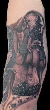 Woman with gas mask tattoo