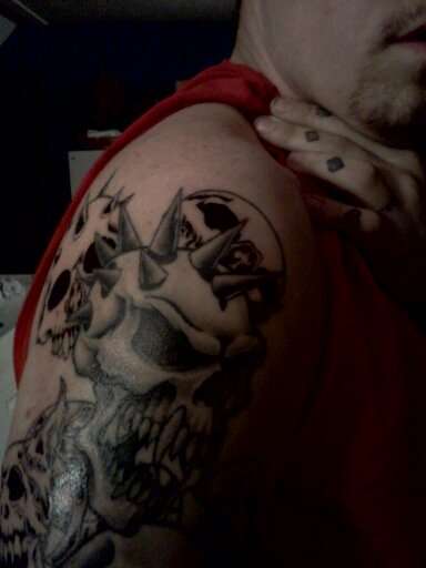 clean skull work tattoo