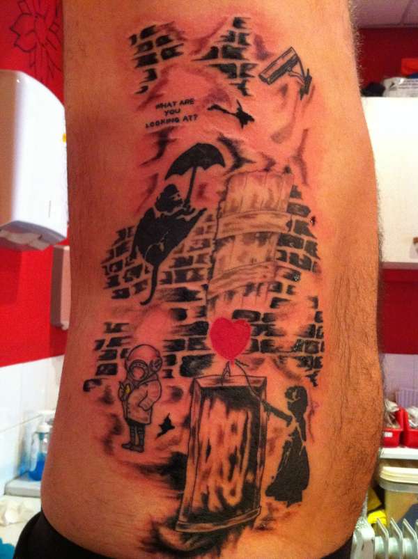 this tattoo is down the rib cage and its from the graffithi arti tattoo
