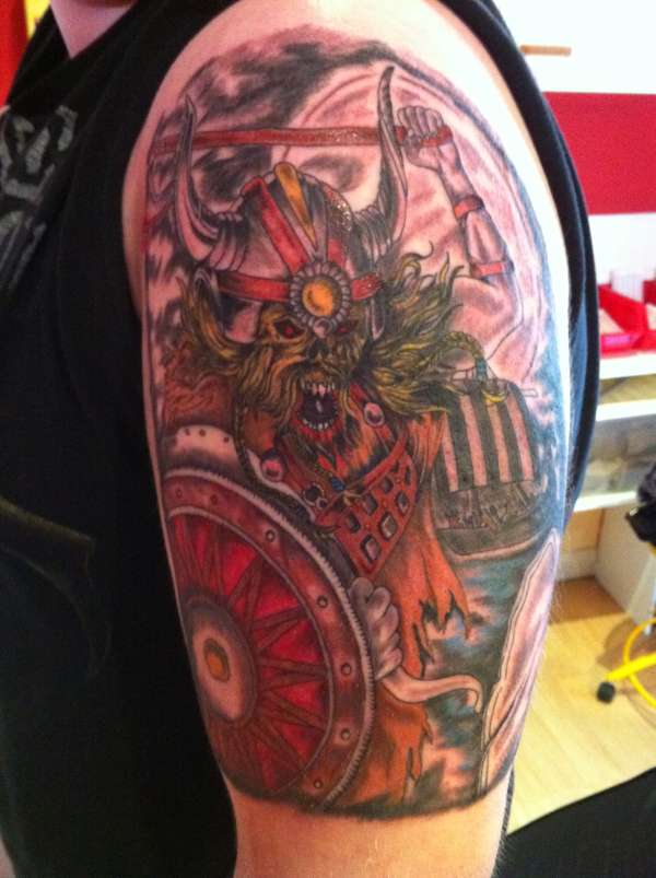 top arm tattoo