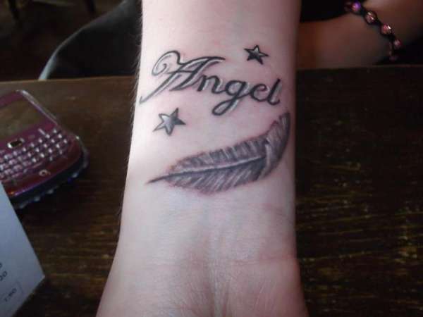 Angel/Wrist/feather tattoo