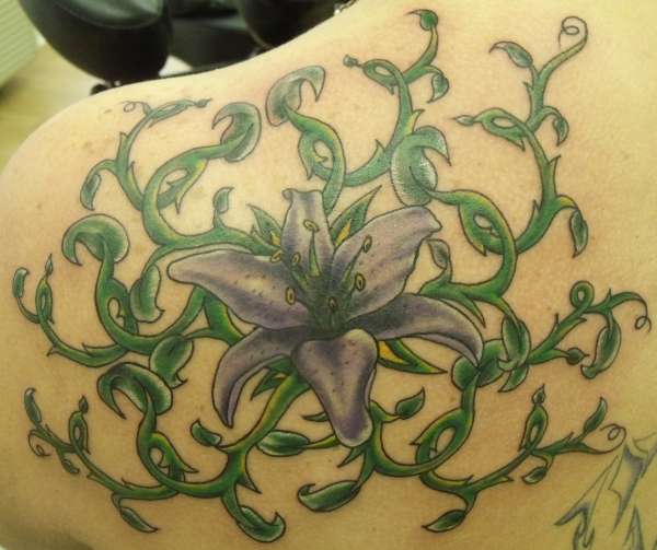 Lily and vines tattoo