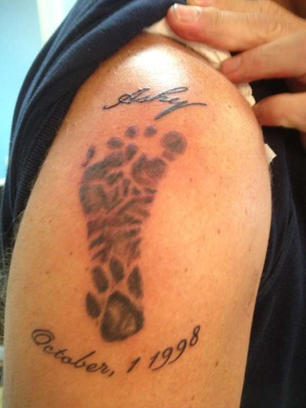 ashy footprint tattoo