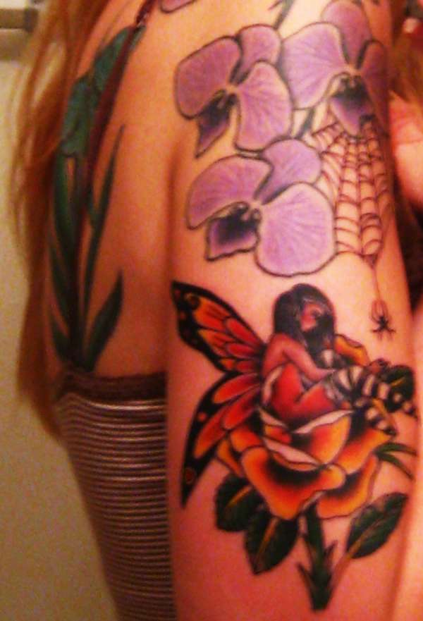 fairy and spiderweb tattoo