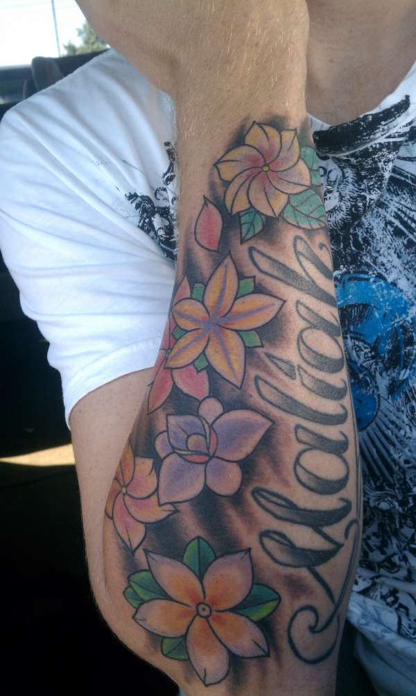 hawaiian flowers tattoo