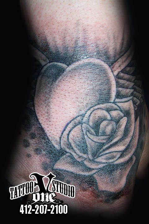 heart and rose tattoo