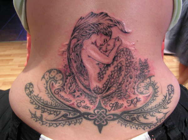 mermaid on wifes back tattoo