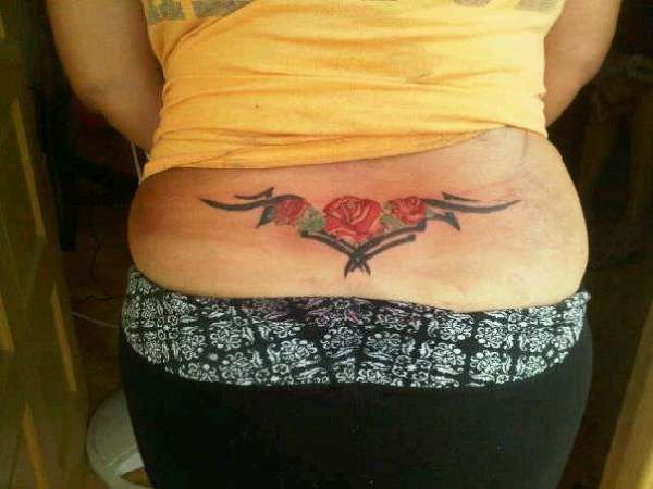 tribal rose may be eazy tattoo