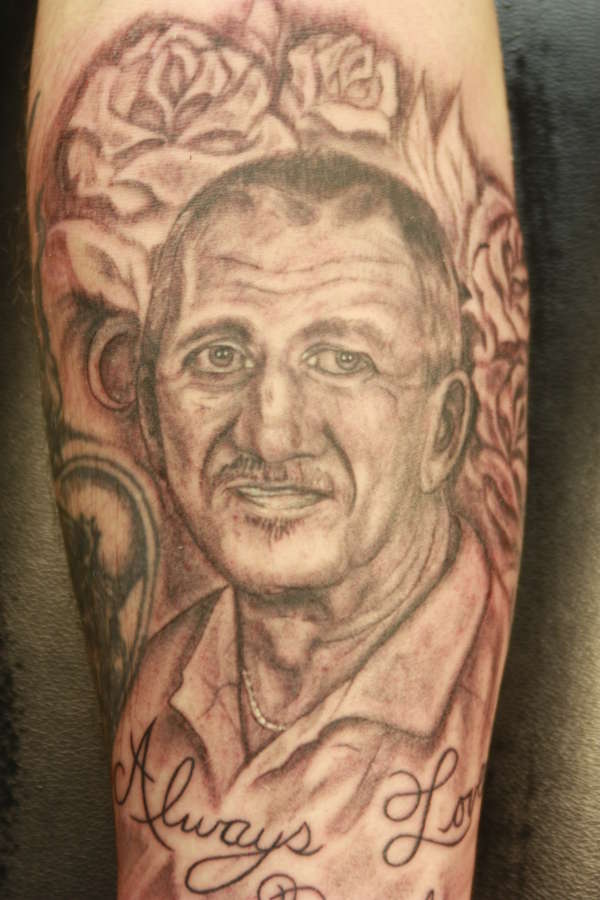 A loving father to his family tattoo