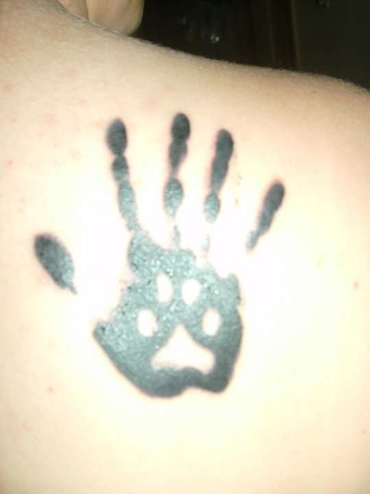 Animal/Human Unity tattoo