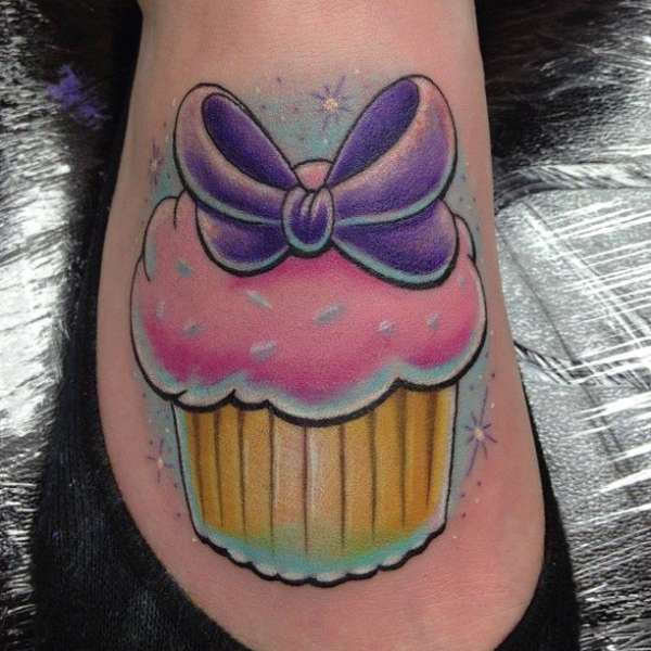 Cupcake tattoo on foot by Craig Holmes tattoo