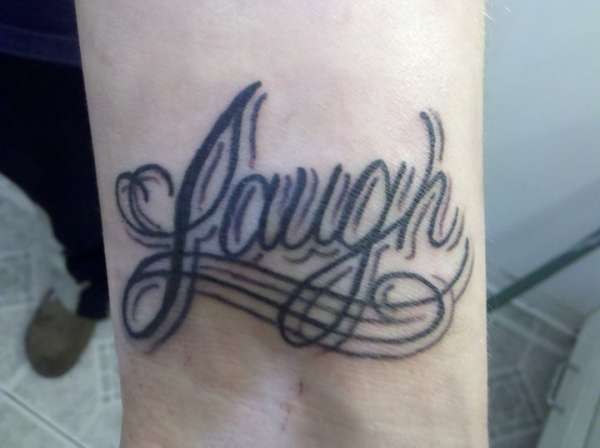 Laugh tattoo