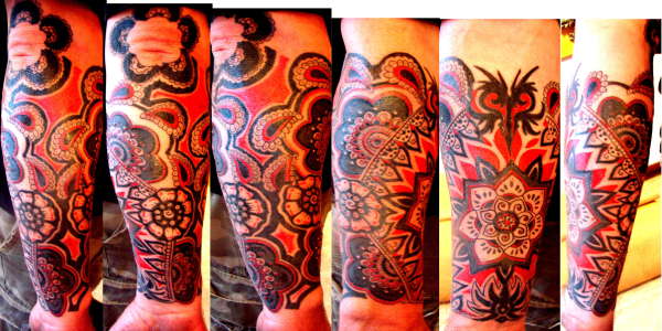 Lower sleeve custom work tattoo