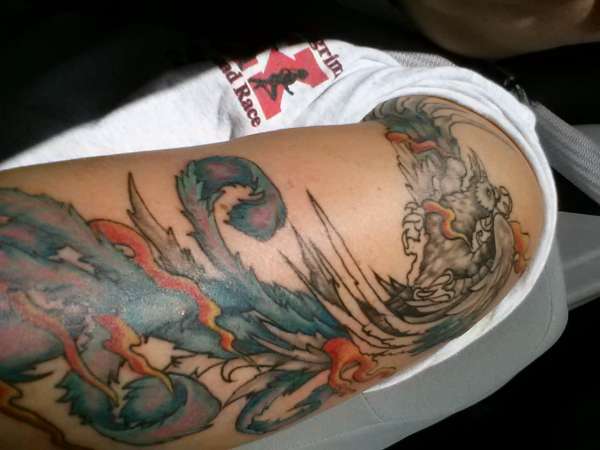 Marty the Phoenix half colored tattoo