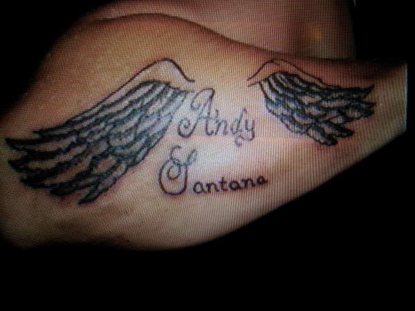 Wings with names tattoo