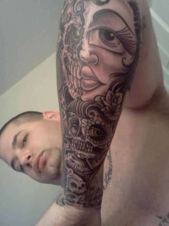 both diff.cust.work other side of half sleeve tattoo