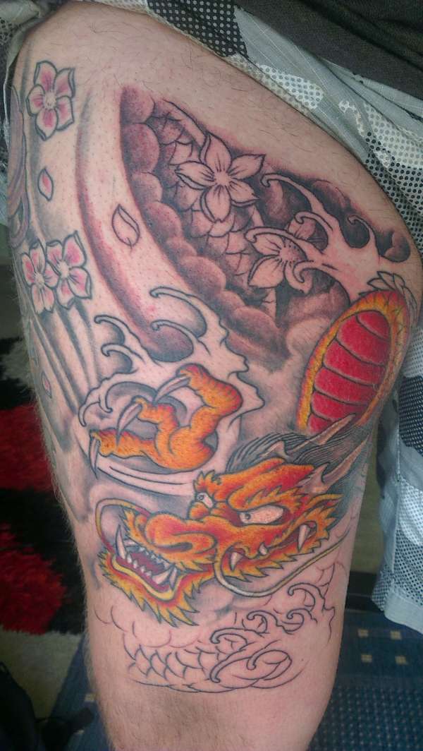 second session on my dragon thigh tattoo