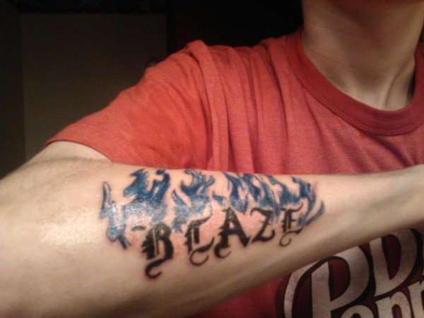 Blaze in blue flame tattoo